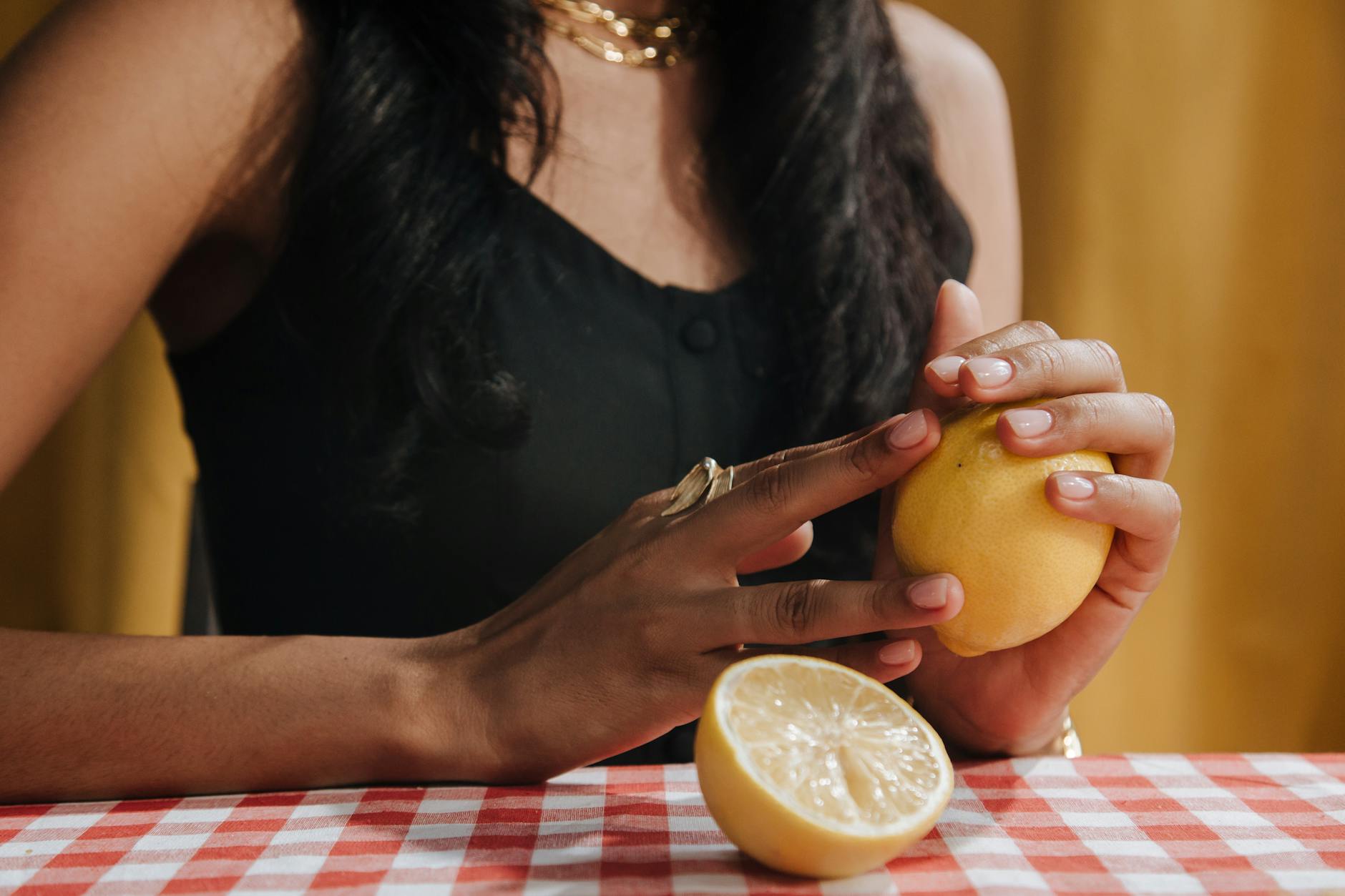Bright ripe lemons arranged on a pastel background, symbolizing varied sensations in pleasure cycles